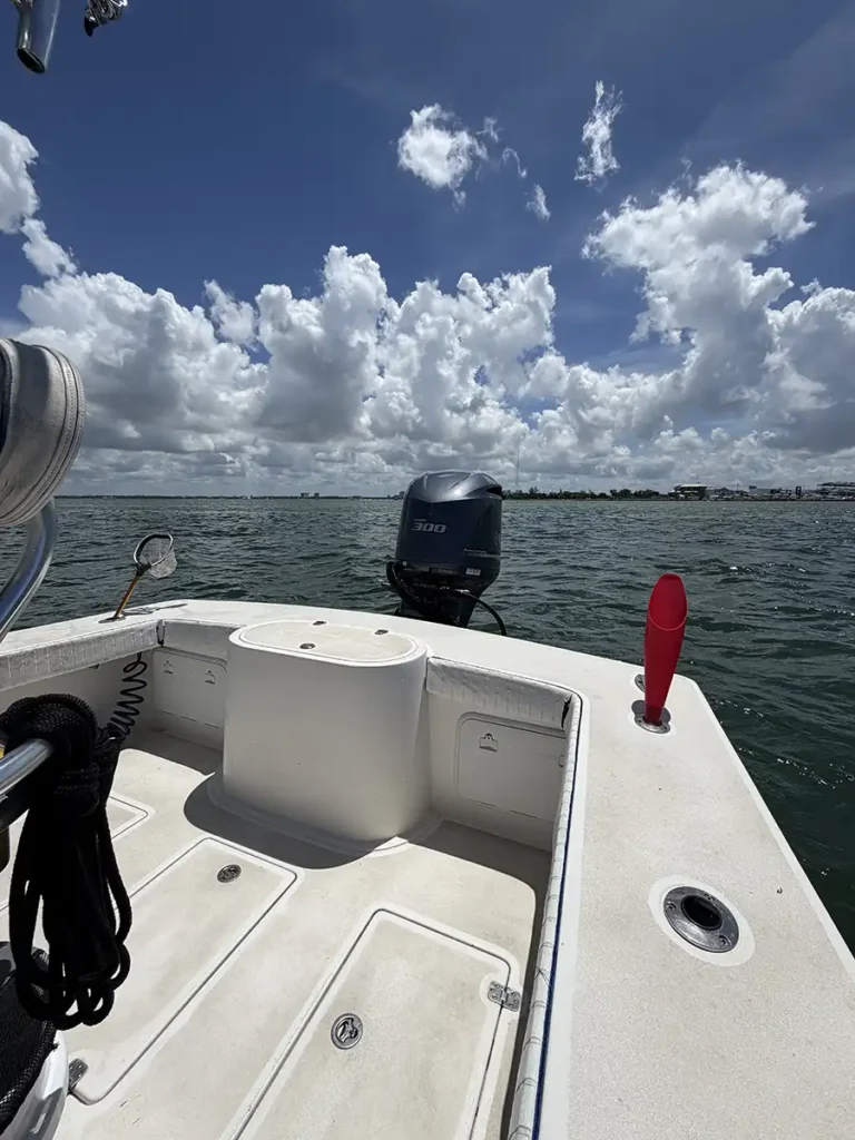 Aft fishing deck and outboard motor on a Sarasota fishing charter boat