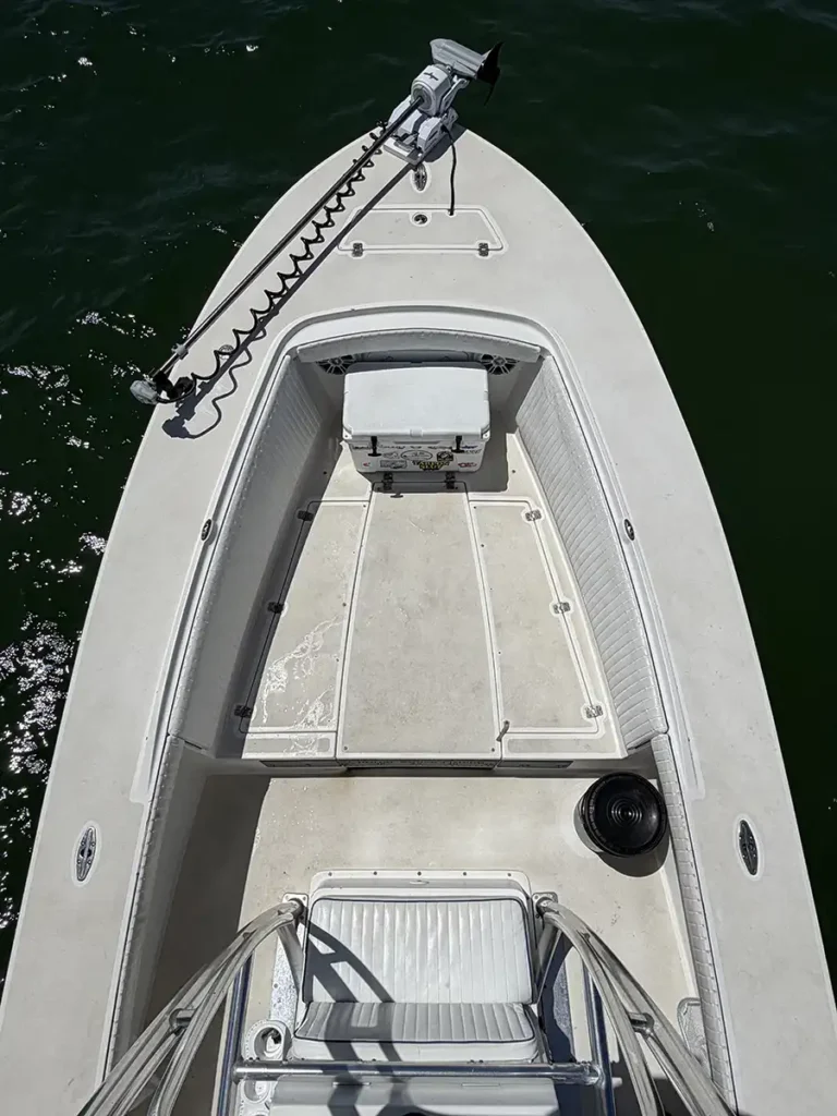 Bow fishing deck with trolling motor and seating on a Sarasota fishing charter boat